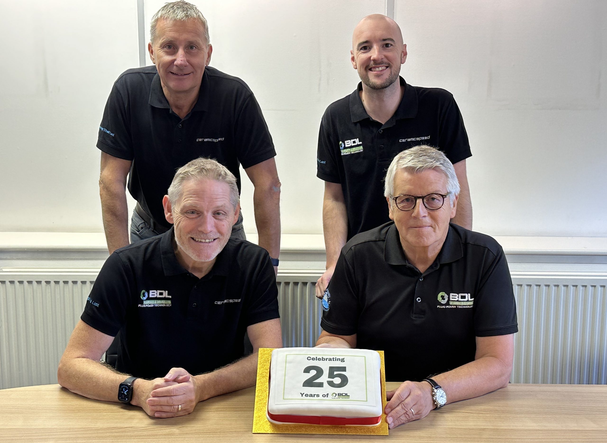 Bearings & Drives Celebrate 25 Years. Top left to right Steve Bacon, Ben Booth. Bottom left to right John Middleton, William Simpson
